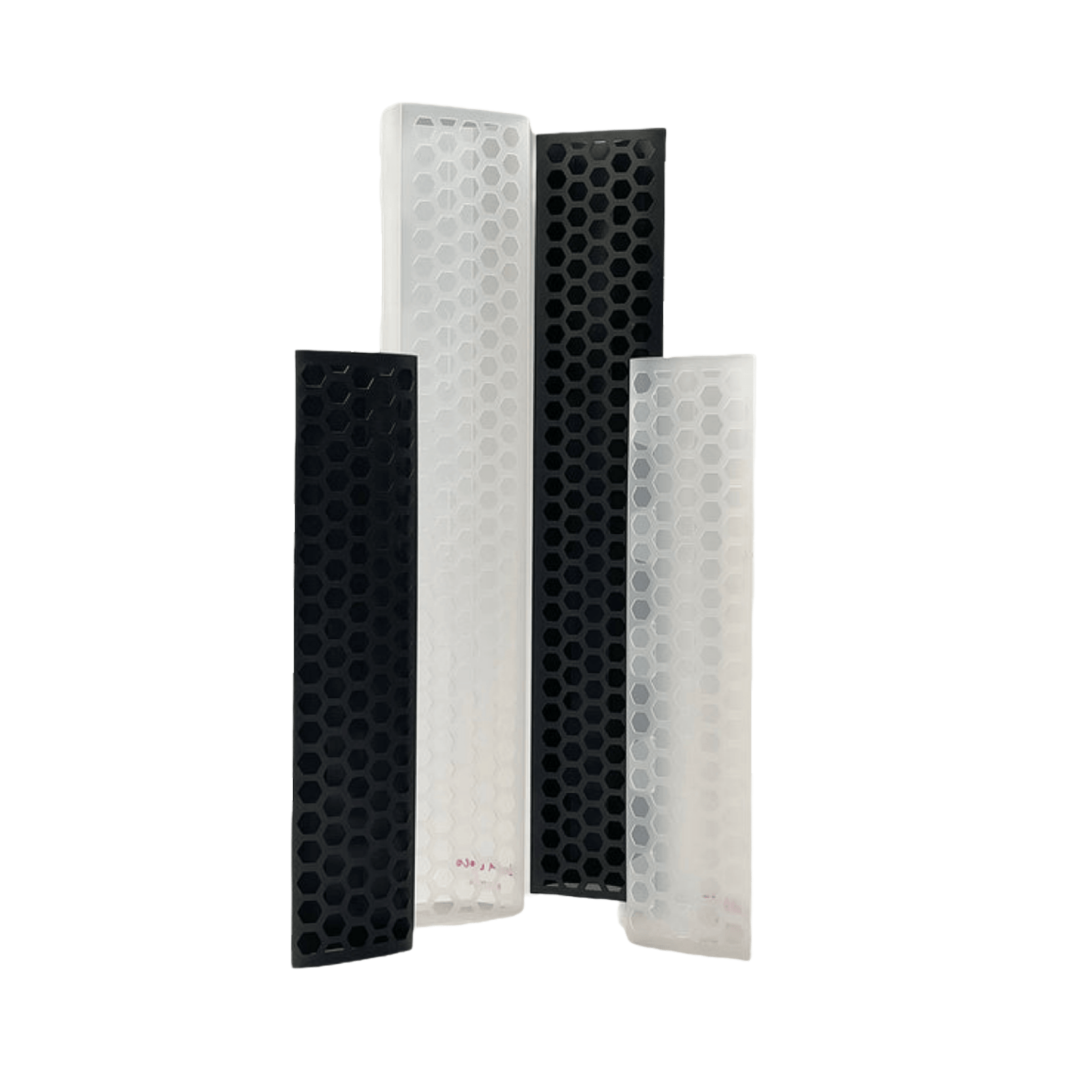 Four rectangular, honeycomb-patterned structures, two black and two white.